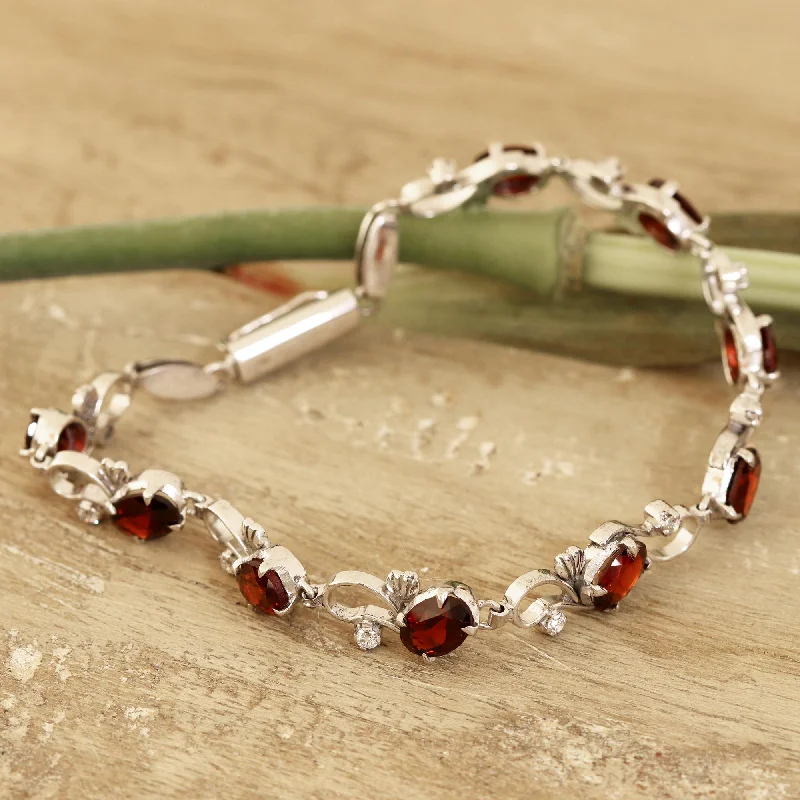 Bangles with gothic-inspired engravings for drama -Endless Garden Garnet and Sterling Silver Garden Motif Link Bracelet