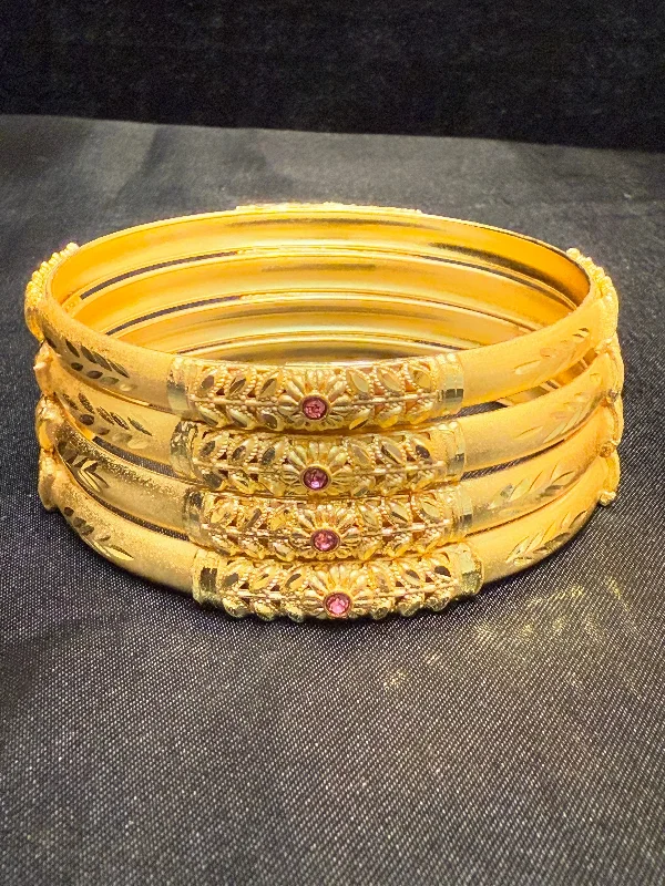 Bangles with gothic-inspired engravings for drama -Alluring Enamel Gold Plated With Pink Color Beautiful Leaf Design Bangles