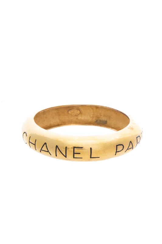 Rose gold bangles with geometric cutout designs -Vintage Chanel Paris Bangle