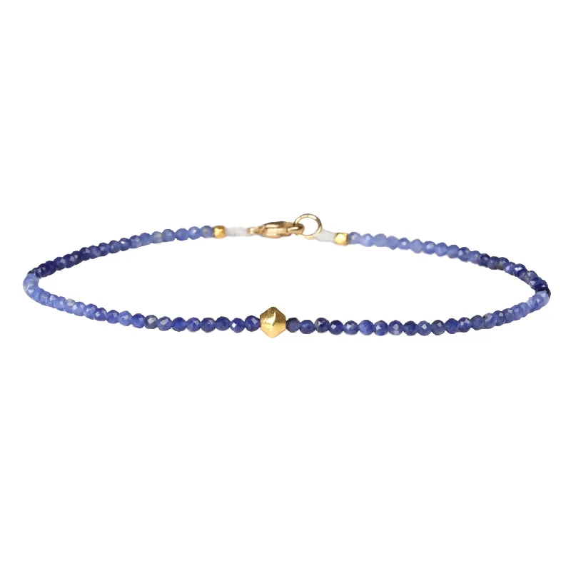 Bracelets with leather wrap for edgy look -Faceted Sodalite Beaded Bracelet with 18K Gold Saucer Bead