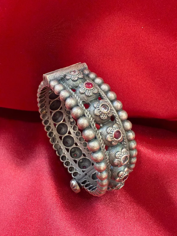 Leather bracelets with adjustable clasp for comfort -Fascinating Tribal Oxidized Silver Ethnic Open Bridal Kada Cuff Bracelet With Maroon And White Stone