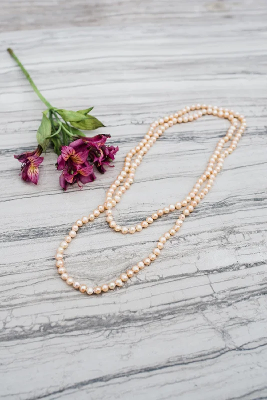 Fashionable necklaces and pendants with birthstones for a personalized gift idea-Blush Long Pearl Necklace