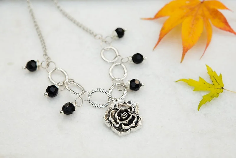 Stunning necklaces and pendants with amethyst gemstones for a calming effect-Flower and Onyx Necklace