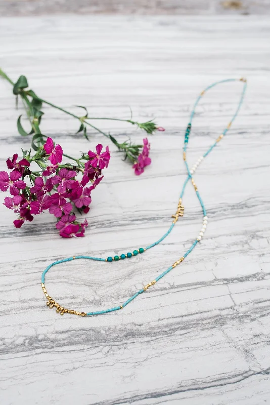 Best necklaces and pendants with intricate filigree for vintage-inspired elegance-Turquoise Stacking Necklace